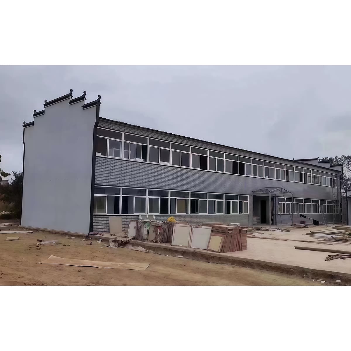 K-Type prefabricated building elevation with glazed corridor and panel facade